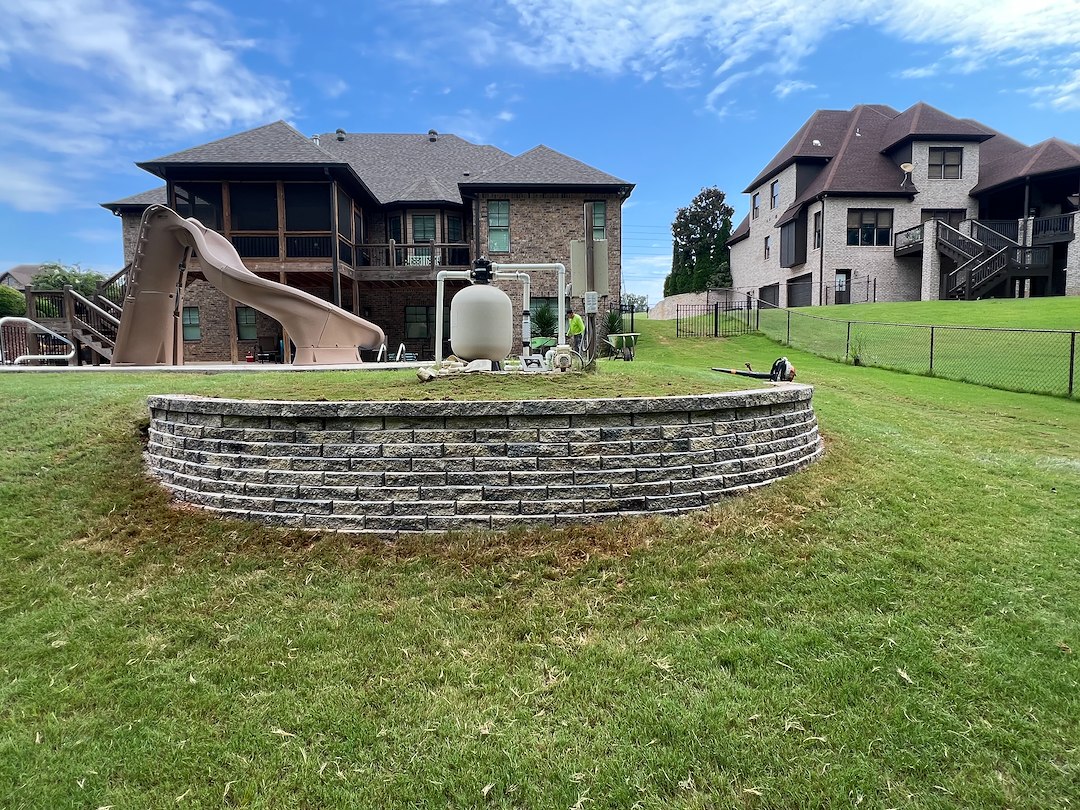 Curved Wall, Clean Lines: A Retaining Wall Project in Mt. Olive, AL Thumbnail